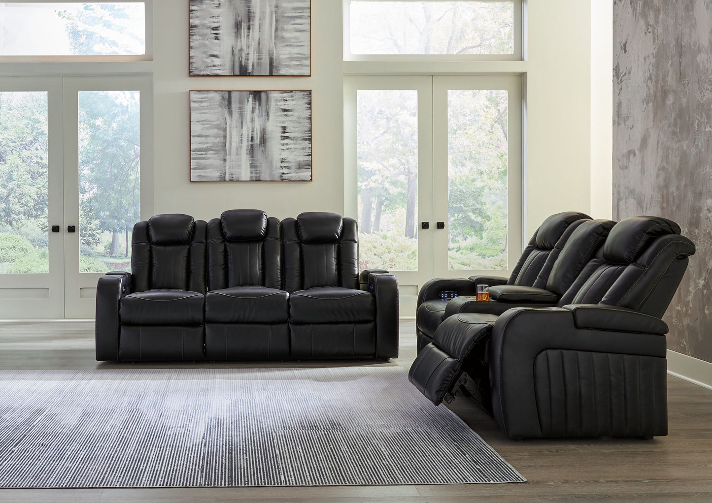 Black Storage Reclining Sofa And Loveseat - front view