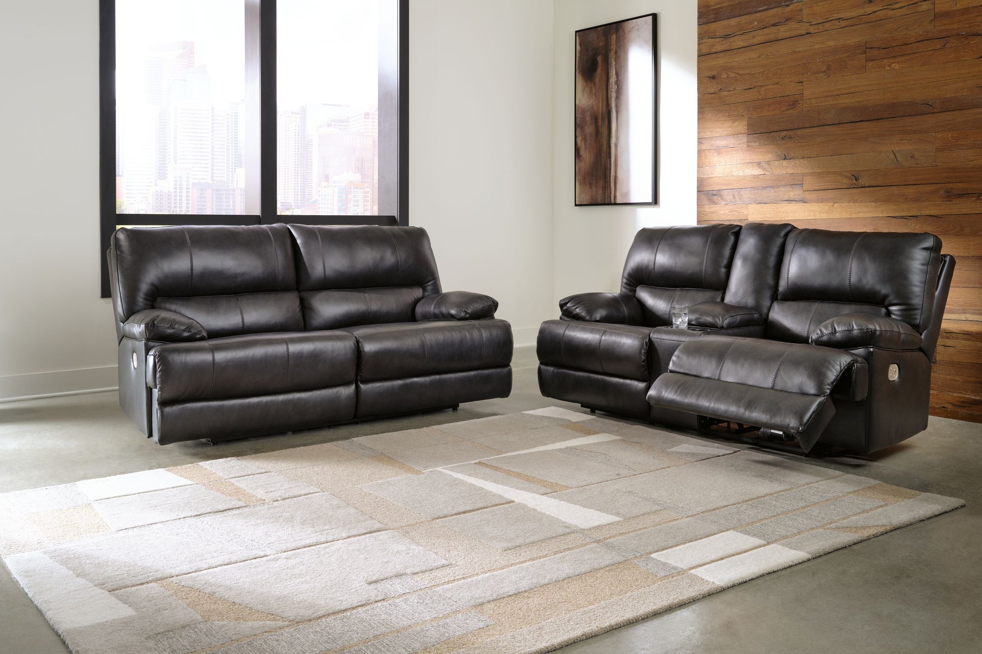 Black Leather Upholstered Reclining Sofa And Loveseat 7/18 - front view