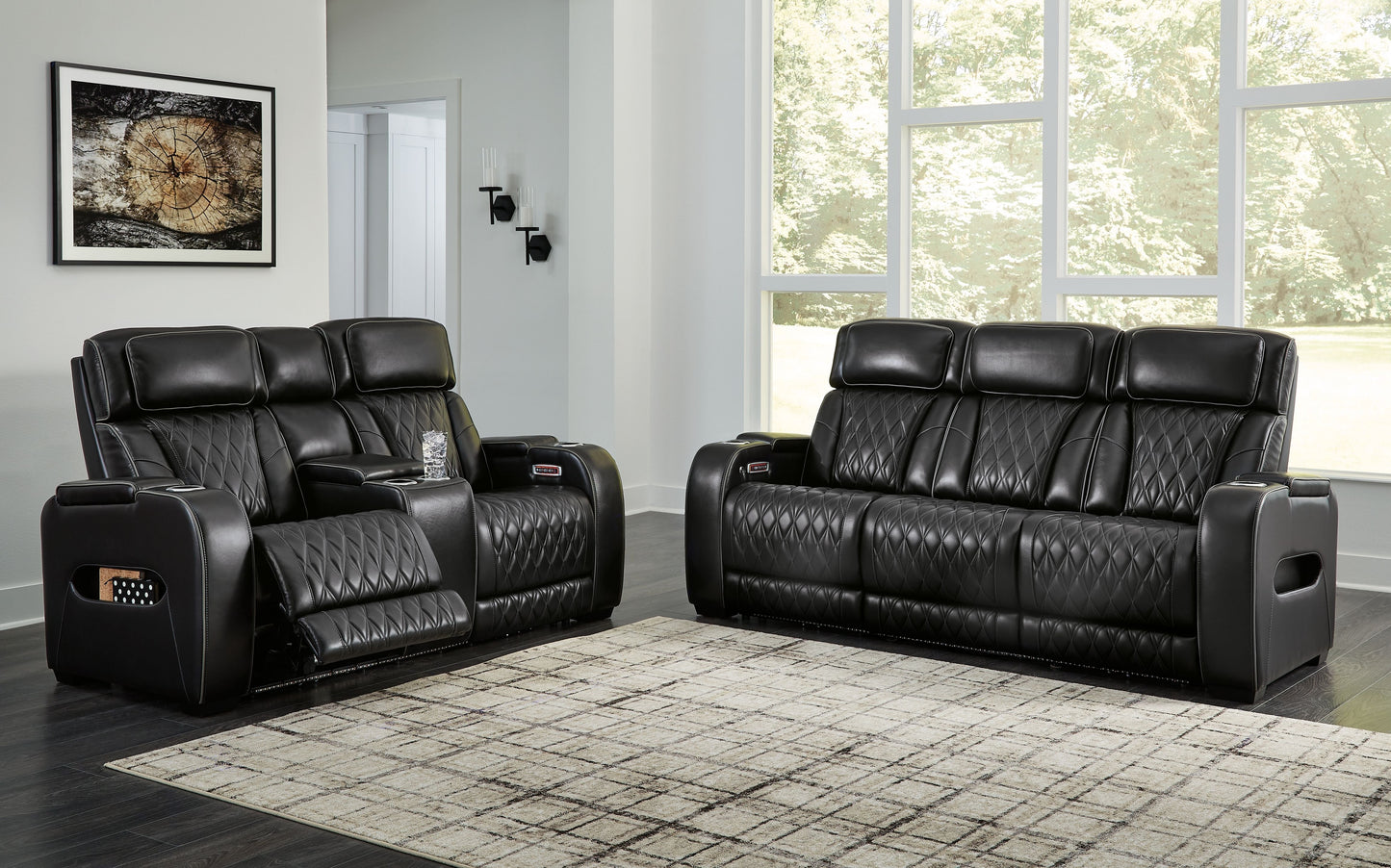 Black Leather Upholstered Reclining Sofa And Loveseat - front view