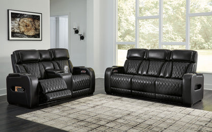 Black Leather Upholstered Reclining Sofa And Loveseat - front view